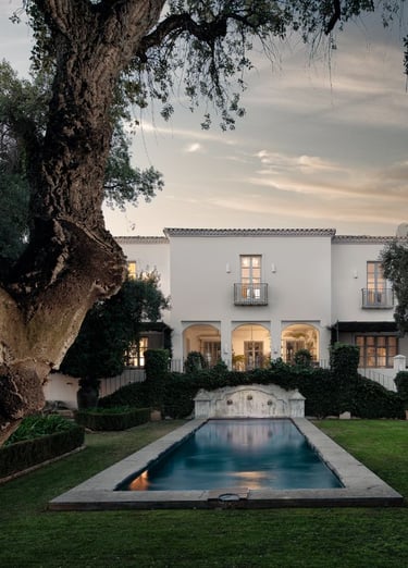 Finca Santa Katerina pool and facade seen at sunset