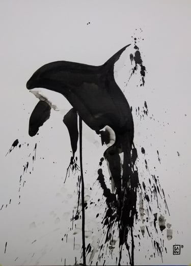 a black and white photo of an orca