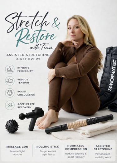 A fitness trainer sitting with assisted stretching tools like a massage gun, foam roller, and Normatec compression boots.