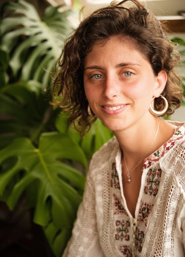 a woman with a large earring
