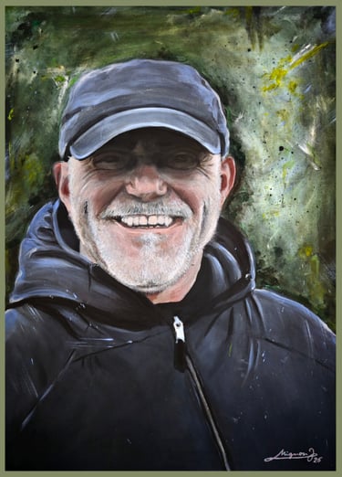 Acrylic portrait painting of a smiling bearded man wearing a baseball cap and black hoodie.
