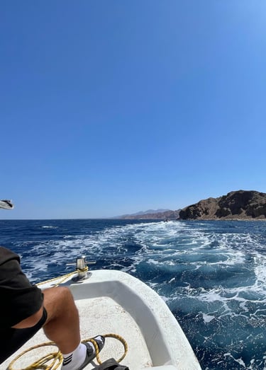a boat sailing in the sea