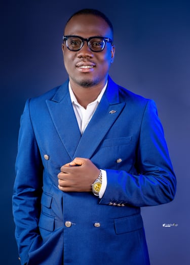 a man in a blue suit and glasses