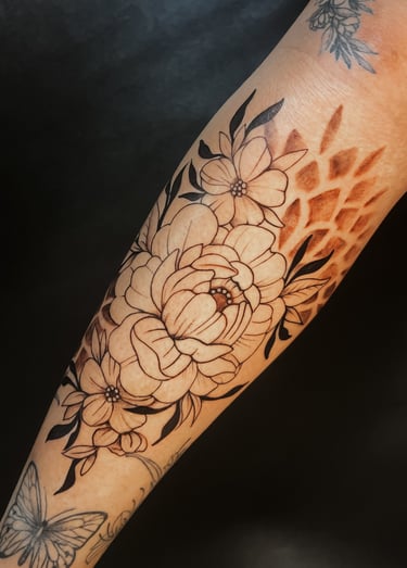 fine line floral tattoo