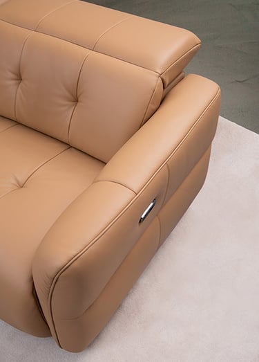 a couch with a leather couch and a chair