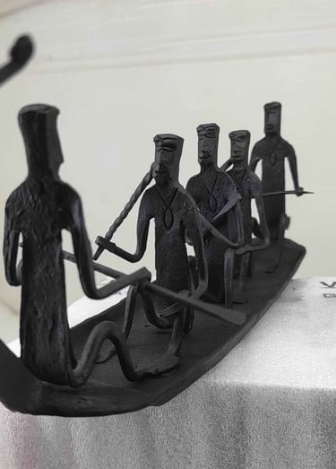 "Bastar tribal iron boat with 5 seated figures – handcrafted Loha Shilp sculpture-Export-ready"