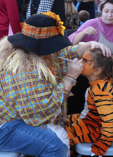 Face painting fun at a halloween event