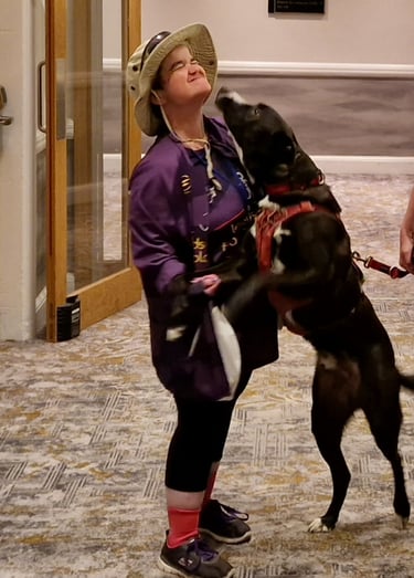 Claire being greeted by her special friend Patch