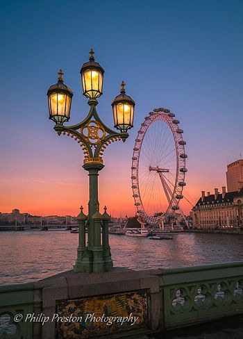 London Eye at sunset, viewed from Westminster Bridge, photography by Philip Preston.