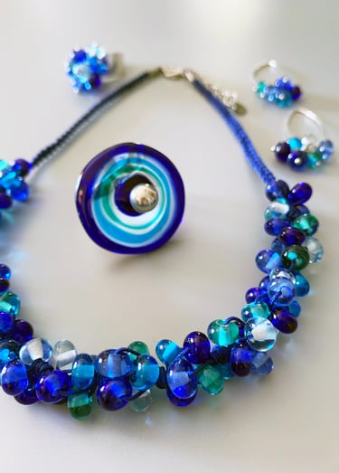 Collier bague et boucles d'oreilles en verre de Murano