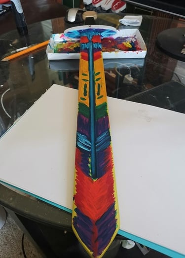 wooden sword painted with acrylic, tribal design