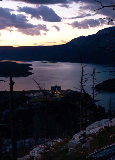 Princ0e of Wales Hotel at dawn overlooking Upper Waterton Lake in Waterton Lakes National Park.