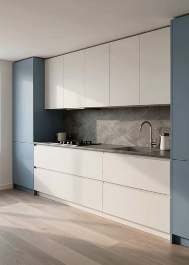 Wide shot photography of a modern, minimalist kitchen featuring sleek cabinets in off-white and muted blue. Soft Northern European daylight illuminates the space, highlighting high-quality textures of wood and stone. Sophisticated interior design portfolio style.
