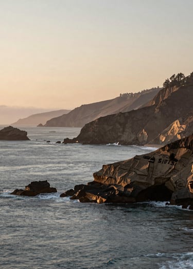 A peaceful landscape photograph of the Oregon coast during sunset, with muted slate blue water and earthy taupe cliffs under a soft beige sky.