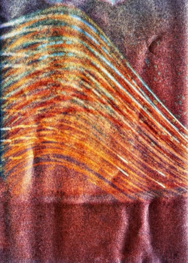 Red background with wave painting, depicting sun path over six months.