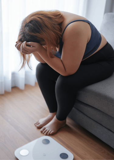 femme grosse triste