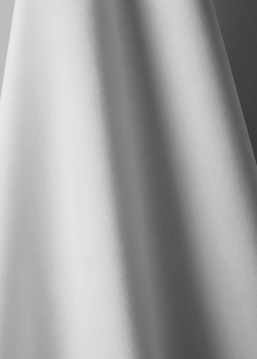 Close up of architectural draping on a high-end garment, showing the play of light and shadow on white fabric, very sleek and modern, palette #F8F8F8 and #333333.