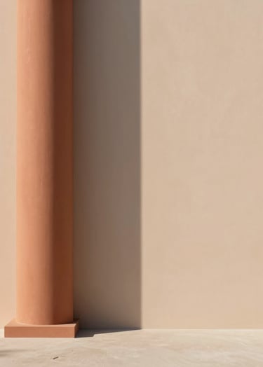Abstract architectural photograph. A single Terracotta column casting a long, sharp Charcoal shadow onto a Soft Sand colored wall. Minimalist and authorial.