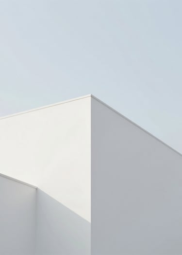 Minimalist architectural photography. A sharp corner of a white building against a soft #D0D5DB sky, clean lines, professional photography, contemporary aesthetic.