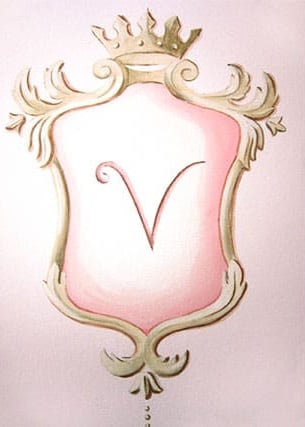 An trompe-l'oeil painted ornate pink and golden crest with a V-monogramme.