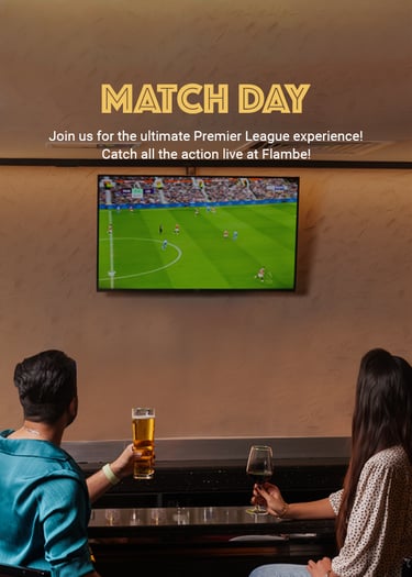 A couple enjoys drinks at a bar while watching a live Premier League match on a wall-mounted TV