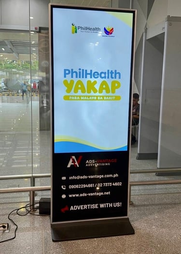 alt="Philhealth airport advertisement at Bicol International Airport Philippines"