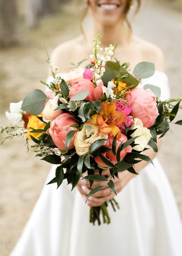 A bride showing is magnificient wedding flower bouquet