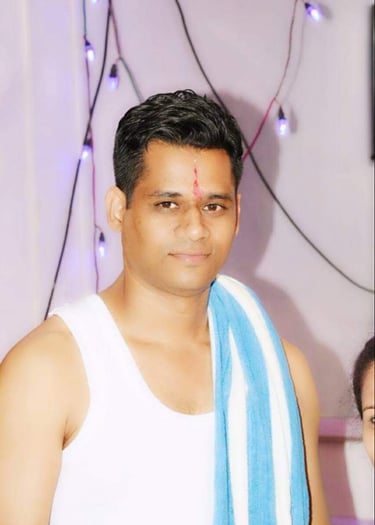 a man named Sainath Vernekar with a towel around his neck