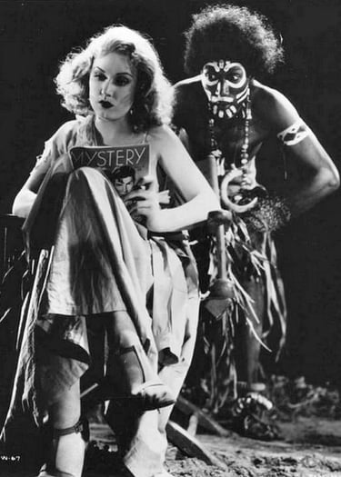 Fay Wray and Noble Johnson pose inbetween scenes