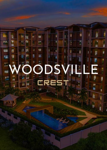 Modern Woodsville Crest condominium complex at dusk featuring a courtyard swimming pool and luxury amenities.