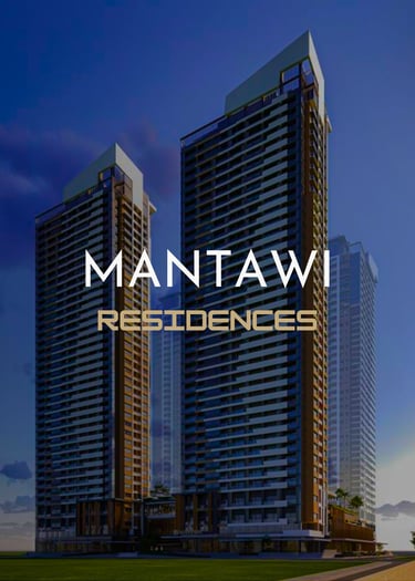 Modern high-rise towers of Mantawi Residences luxury condominium at dusk.