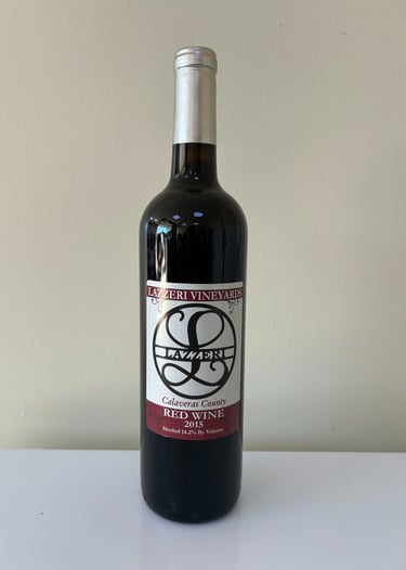 An unopened bottle of wine labeled 2015 Red Blend