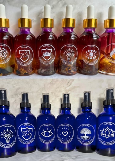 A product lineup of essential oil sprays and anointing oils in brightly colored bottles