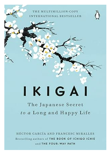 Cover of Ikigai with blue background and cherry blossom design.