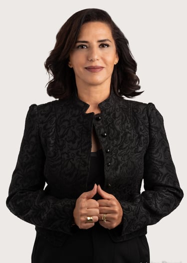 a corporate woman in a black jacket and a ring on her finger