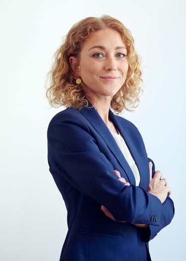 Portrait of a blonde business woman with curls.