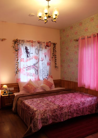 Paris themed bedroom with mountain view in Manali