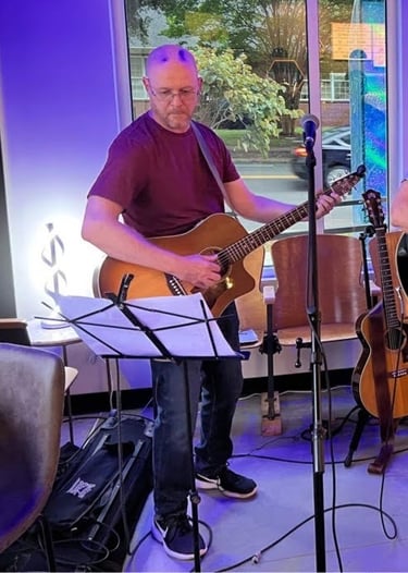 William Finn from Finn's Echo performing in front of live audience
