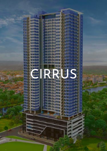 Modern blue high-rise Cirrus residential condominium building overlooking a lush urban landscape.
