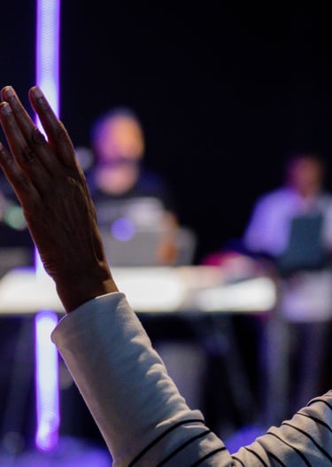 a woman raised her hands