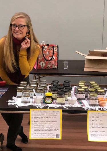 Lucy's Seeds 'N' Things stall at a local market, showcasing handcrafted, healthy snacks
