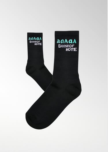 a pair of socks with the words,'a good day for a movie, merch, Bahnhof motte