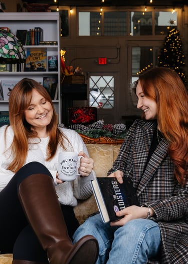 Kandelyne and Katie sitting on the couch together