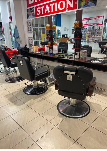 a barber shop with a barber chair and a barber chair