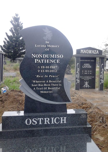 Custom teardrop headstone fitted with a ledger