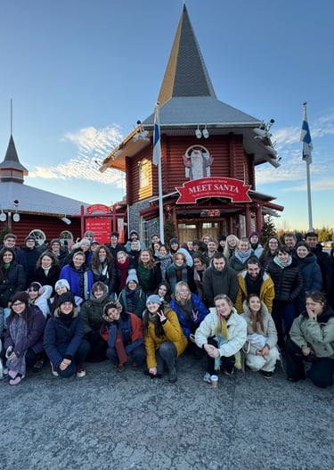 a group of people standing in front of a building