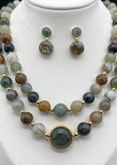 A cozy workshop filled with tools, sketches, and colorful gemstones.