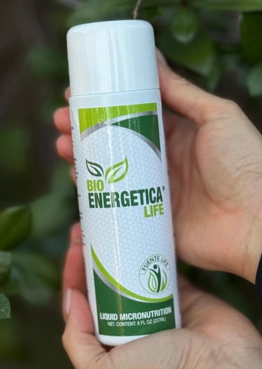 Bioenergetica Life liquid micronutrition bottle held in hand, daily natural energy and wellness supp