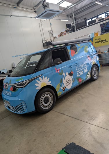 A VW ID Buzz fully wrapped in printed vinyl