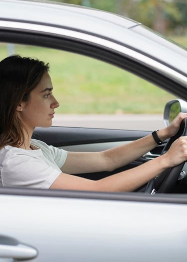 Happy customers receiving keys from a friendly qytetdrive staff member.